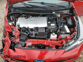 2021 Toyota Prius L Eco z VIN JTDKAMFU0M3145597, wystawiony jako Copart lot #57846175 z przebiegiem 93 882 mil mil oraz Szkoda całkowita • Salvage title. Historia ofert i sprzedaży dostępna na DreamBid. Obrazek 11.