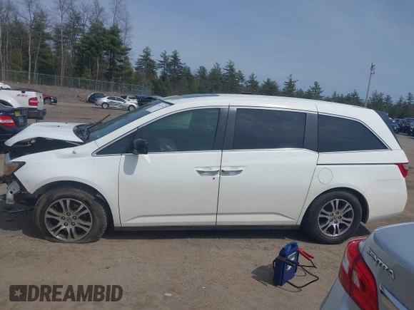 2012 Honda Odyssey EX-L with VIN 5FNRL5H65CB082916, listed as a IAAI auction lot 42052713 with 217,267 mi miles and . Bid and sale history available at carsss.com. Image 15.