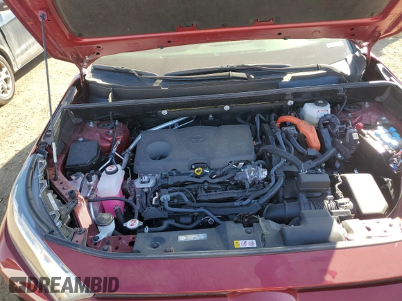 2024 Toyota RAV4 Hybrid XLE Premium with VIN JTMB6RFVXRD120389, listed as a Copart auction lot 47596985 with 16,956 mi miles and Salvage Title. Bid and sale history available at DreamBid. Image 12.
