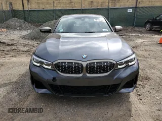 2022 BMW 3 Series M340i xDrive with VIN 3MW5U9J06N8C67957, listed as a Copart auction lot 49737485 with 10,563 mi miles and Salvage Title. Bid and sale history available at carsss.com. Image 5.