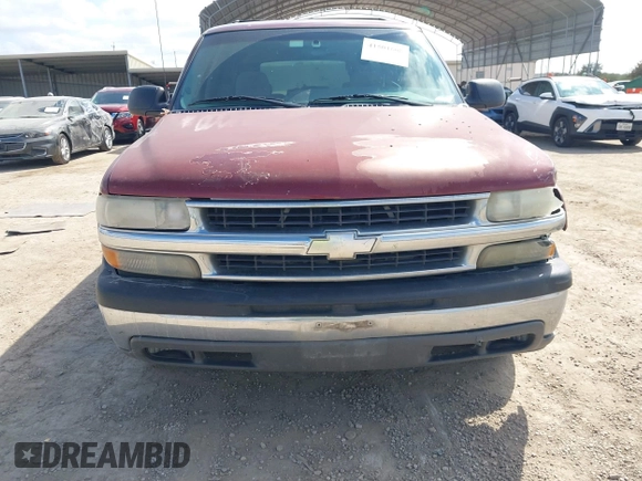 2003 Chevrolet Suburban LT with VIN 1GNEC16Z13J247753, listed as a IAAI auction lot 41501608 with 300,977 mi miles. Bid and sale history available at carsss.com. Image 12.