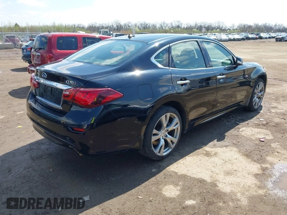2015 Infiniti Q70 with VIN JN1BY1ARXFM562402, listed as a IAAI auction lot 41910400 with 131,469 mi miles and . Bid and sale history available at DreamBid. Image 4.