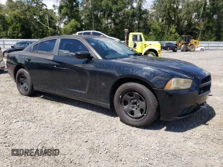 2014 Dodge Charger Police with VIN 2C3CDXAT3EH265909, listed as a Copart auction lot 72352974 with 95,582 mi miles and Salvage Title. Bid and sale history available at carsss.com. Image 4.
