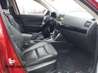 2015 Mazda CX-5 Grand Touring with VIN JM3KE4DY6F0501072, listed as a IAAI auction lot 41534176 with 90,160 mi miles. Bid and sale history available at carsss.com. Image 5.