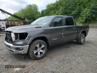 2021 Ram 1500 Laramie with VIN 1C6SRFJT3MN639323, listed as a Copart auction lot 64407015 with 30,985 mi miles and Salvage title. Bid and sale history available at DreamBid. Image 1.