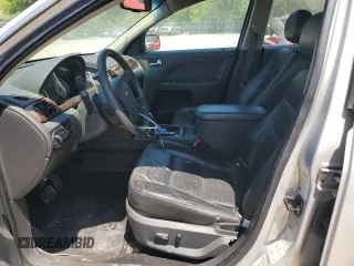 2009 Ford Taurus Limited z VIN 1FAHP25W09G118860, wystawiony jako Copart lot #54604575 z przebiegiem 212 886 mil mil oraz Szkoda całkowita • Salvage title. Historia ofert i sprzedaży dostępna na DreamBid. Obrazek 7.