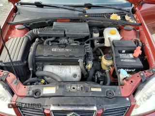 2004 Suzuki Forenza S z VIN KL5JD52Z94K061669, wystawiony jako Copart lot #81585854 z przebiegiem 80 186 mil mil oraz Szkody całkowita. Historia ofert i sprzedaży dostępna na DreamBid. Obrazek 11.