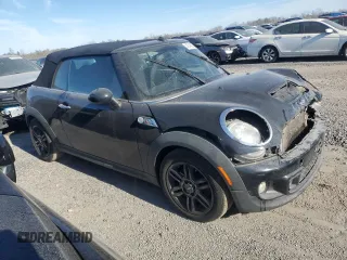 2015 MINI Convertible S with VIN WMWZP3C58F2A91317, listed as a Copart auction lot 42748905 with 164,932 mi miles and Salvage title. Bid and sale history available at DreamBid. Image 4.