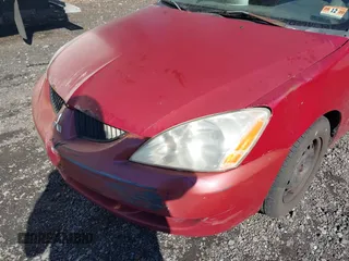 2005 Mitsubishi Lancer ES with VIN JA3AJ26E55U031209, listed as a IAAI auction lot 41541470 with 290,334 mi miles. Bid and sale history available at carsss.com. Image 6.
