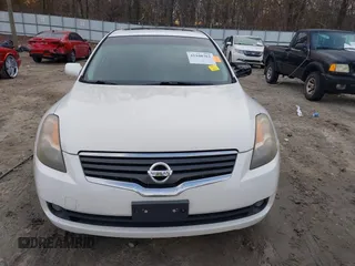 2009 Nissan Altima 2.5 S with VIN 1N4AL21EX9C143184, listed as a IAAI auction lot 41108362 with 195,564 mi miles. Bid and sale history available at carsss.com. Image 12.