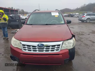 2011 Subaru Forester X with VIN JF2SHBBC0BH722336, listed as a IAAI auction lot 41973327 with 173,935 mi miles and . Bid and sale history available at DreamBid. Image 6.