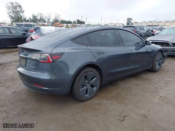 2022 Tesla Model 3 Long Range with VIN 5YJ3E1EBXNF138538, listed as a IAAI auction lot 41771647 with 31,250 mi miles. Bid and sale history available at carsss.com. Image 4.