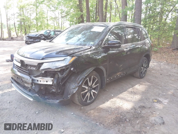 2019 Honda Pilot Touring 7-Passenger with VIN 5FNYF6H60KB030990, listed as a IAAI auction lot 42160762 with 68,807 mi miles and . Bid and sale history available at DreamBid. Image 17.