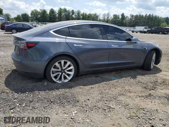 2020 Tesla Model 3 Standard Range Plus with VIN 5YJ3E1EA6LF614045, listed as a Copart auction lot 65222584 with 59,823 mi miles and Salvage Title. Bid and sale history available at DreamBid. Image 3.