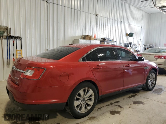 2012 Ford Taurus Limited z VIN 1FAHP2FWXCG104471, wystawiony jako Copart lot #54731335 z przebiegiem 221 397 mil mil oraz Szkoda całkowita • Salvage title. Historia ofert i sprzedaży dostępna na DreamBid. Obrazek 3.