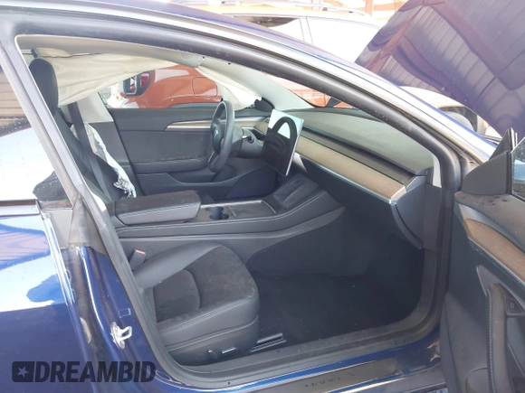 2023 Tesla Model 3 z VIN 5YJ3E1EA2PF557011, wystawiony jako IAAI lot #42347980 z przebiegiem 15 358 mil mil oraz . Historia ofert i sprzedaży dostępna na DreamBid. Obrazek 5.
