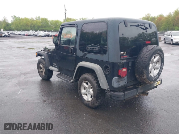 2004 Jeep Wrangler X with VIN 1J4FA39S94P707411, listed as a IAAI auction lot 42187856 with 189,519 mi miles. Bid and sale history available at carsss.com. Image 3.