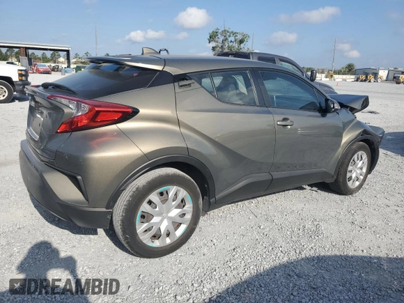 2021 Toyota C-HR LE z VIN NMTKHMBXXMR130792, wystawiony jako Copart lot #54854625 z przebiegiem 27 478 mil mil oraz Nie do naprawy • Non repairable. Historia ofert i sprzedaży dostępna na DreamBid. Obrazek 3.