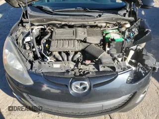 2014 Mazda 2 Touring z VIN JM1DE1LZ7E0179941, wystawiony jako Copart lot #86748264 z przebiegiem 155 816 mil mil oraz Szkoda całkowita • Salvage title. Historia ofert i sprzedaży dostępna na DreamBid. Obrazek 11.