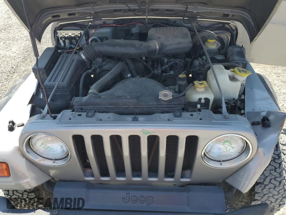 2000 Jeep Wrangler SE with VIN 1J4FA29P7YP737289, listed as a Copart auction lot 61869865 with 91,097 mi miles and Salvage title. Bid and sale history available at DreamBid. Image 11.