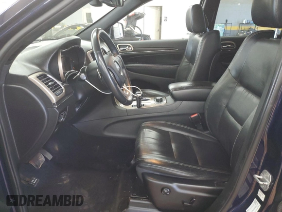 2014 Jeep Grand Cherokee Limited with VIN 1C4RJFBG7EC214913, listed as a Copart auction lot 60555845 with 148,699 mi miles and Salvage title. Bid and sale history available at DreamBid. Image 7.