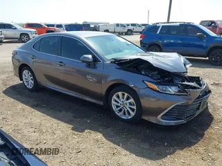 2023 Toyota Camry LE z VIN 4T1C11AK3PU129350, wystawiony jako IAAI lot #41786961 z przebiegiem 27 979 mil mil oraz . Historia ofert i sprzedaży dostępna na DreamBid. Obrazek 1.