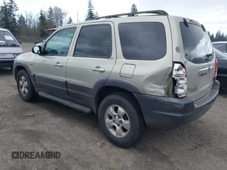 2003 Mazda Tribute ES with VIN 4F2CZ96193KM10389, listed as a IAAI auction lot 41938872 with 179,722 mi miles and . Bid and sale history available at DreamBid. Image 3.