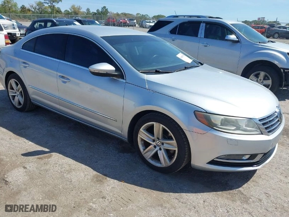 2013 Volkswagen CC Sport with VIN WVWBN7AN7DE556635, listed as a IAAI auction lot 41808795 with 88,482 mi miles. Bid and sale history available at carsss.com. Image 1.