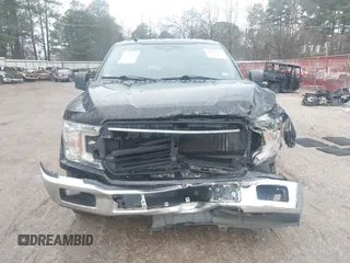 2019 Ford F-150 XL with VIN 1FTEW1C57KKD51657, listed as a IAAI auction lot 41426305 with 150,471 mi miles and . Bid and sale history available at DreamBid. Image 12.