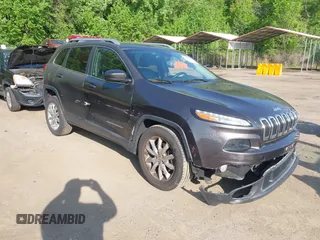 2015 Jeep Cherokee Limited with VIN 1C4PJMDB4FW610956, listed as a IAAI auction lot 42167270 with 118,219 mi miles and . Bid and sale history available at DreamBid. Image 1.