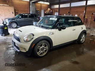 2009 MINI Hardtop S with VIN WMWMF73509TW83066, listed as a Copart auction lot 58603205 with 113,242 mi miles and Salvage title. Bid and sale history available at DreamBid. Image 1.
