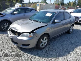 2006 Mazda 3 i with VIN JM1BK12F461530369, listed as a IAAI auction lot 41990008 with 169,878 mi miles. Bid and sale history available at carsss.com. Image 17.