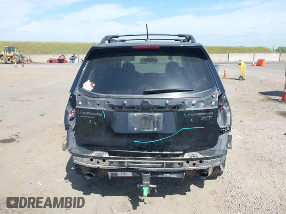2015 Subaru Forester XT Touring with VIN JF2SJGUC5FH822632, listed as a IAAI auction lot 42032965 with 118,111 mi miles and . Bid and sale history available at DreamBid. Image 17.