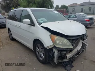 2010 Honda Odyssey Touring with VIN 5FNRL3H96AB070155, listed as a IAAI auction lot 42526760 with 160,104 mi miles and . Bid and sale history available at DreamBid. Image 1.