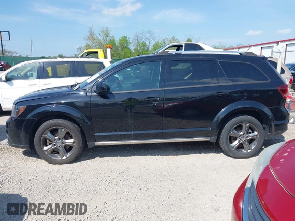 2015 Dodge Journey Crossroad with VIN 3C4PDDGG8FT633483, listed as a IAAI auction lot 42132925 with 138,235 mi miles and . Bid and sale history available at DreamBid. Image 14.