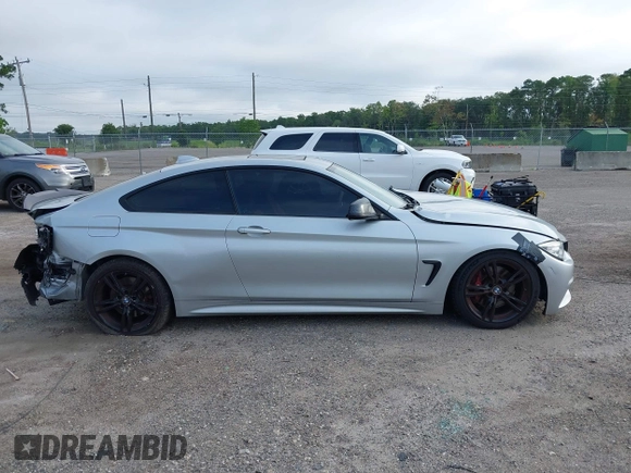 2015 BMW 4 Series 435i z VIN WBA3R1C53FK195523, wystawiony jako IAAI lot #42646432 z przebiegiem 104 756 mil mil oraz . Historia ofert i sprzedaży dostępna na DreamBid. Obrazek 13.