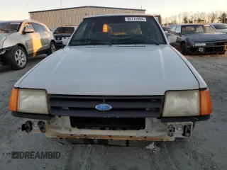 1988 Ford Escort z VIN 1FAPP959XJW370611, wystawiony jako Copart lot #86715994 z przebiegiem 3424 mil mil oraz Tytuł czysty. Historia ofert i sprzedaży dostępna na DreamBid. Obrazek 5.