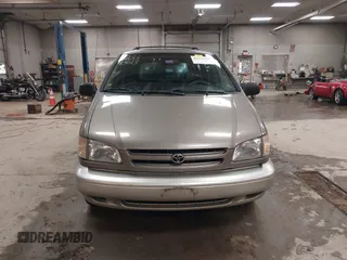 1999 Toyota Sienna LE z VIN 4T3ZF13CXXU127488, wystawiony jako IAAI lot #42334323 z przebiegiem 247 917 mil mil oraz . Historia ofert i sprzedaży dostępna na DreamBid. Obrazek 13.