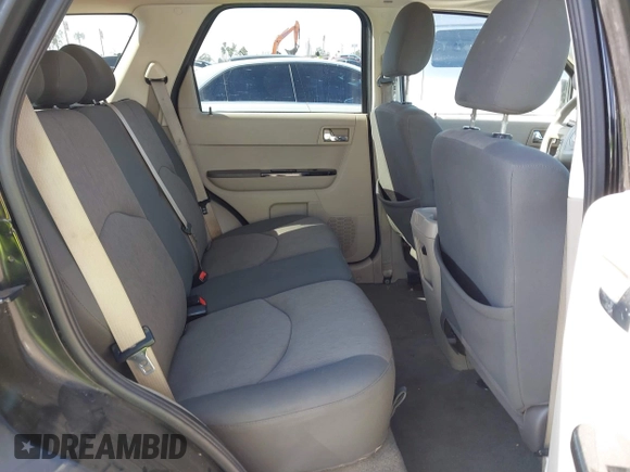 2008 Mazda Tribute Sport with VIN 4F2CZ02Z68KM15550, listed as a IAAI auction lot 41615133 with 215,803 mi miles and . Bid and sale history available at DreamBid. Image 8.