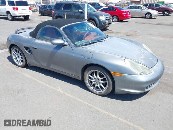 2003 Porsche Boxster with VIN WP0CA29893U621152, listed as a IAAI auction lot 42533307 with 70,106 mi miles and . Bid and sale history available at DreamBid. Image 1.