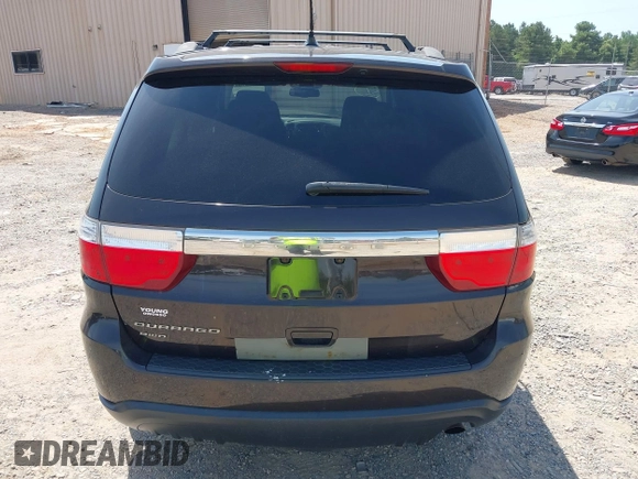 2013 Dodge Durango SXT with VIN 1C4RDJAG7DC580249, listed as a IAAI auction lot 42535723 with 199,626 mi miles and . Bid and sale history available at DreamBid. Image 16.