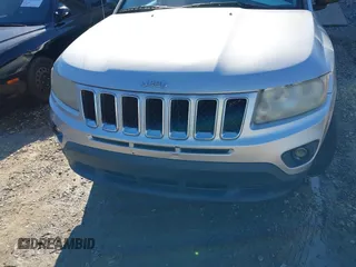 2011 Jeep Compass with VIN 1J4NT1FB8BD248904, listed as a IAAI auction lot 41667133 with 212,887 mi miles. Bid and sale history available at carsss.com. Image 6.