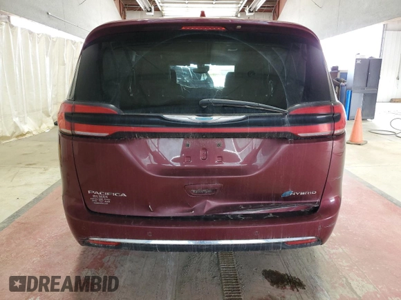 2021 Chrysler Pacifica Hybrid Touring L with VIN 2C4RC1L77MR596250, listed as a Copart auction lot 52892595 with 114,876 mi miles and Salvage title. Bid and sale history available at DreamBid. Image 6.