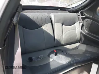 2000 Hyundai Tiburon z VIN KMHJG35F5YU191588, wystawiony jako IAAI lot #41934653 z przebiegiem 161 590 mil mil oraz . Historia ofert i sprzedaży dostępna na DreamBid. Obrazek 8.