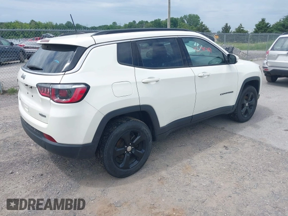 2019 Jeep Compass Latitude with VIN 3C4NJDBB8KT684116, listed as a IAAI auction lot 42596469 with 73,219 mi miles and . Bid and sale history available at DreamBid. Image 4.