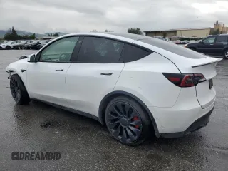 2022 Tesla Model Y Performance with VIN 7SAYGDEF3NF390848, listed as a Copart auction lot 49441025 with 42,488 mi miles and Salvage Title. Bid and sale history available at DreamBid. Image 2.