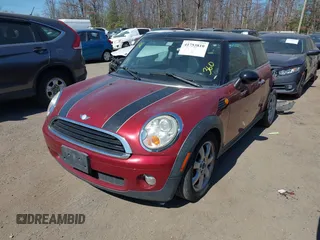 2007 MINI Hardtop with VIN WMWMF33537TU60428, listed as a IAAI auction lot 41753810 with 218,137 mi miles and . Bid and sale history available at DreamBid. Image 2.