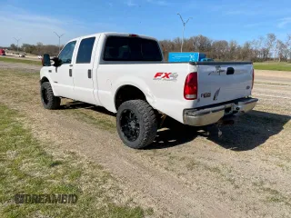 2004 Ford F-350 XL with VIN 1FTSW31P54EB26772, listed as a Copart auction lot 56300325 with 210,944 mi miles and Clean Title. Bid and sale history available at DreamBid. Image 3.