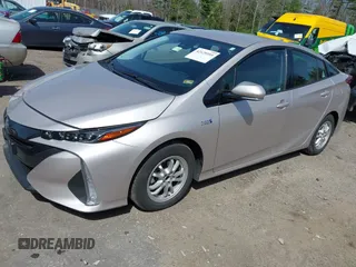 2018 Toyota Prius Plus with VIN JTDKARFP5J3091877, listed as a IAAI auction lot 42129355 with 48,736 mi miles and . Bid and sale history available at DreamBid. Image 2.