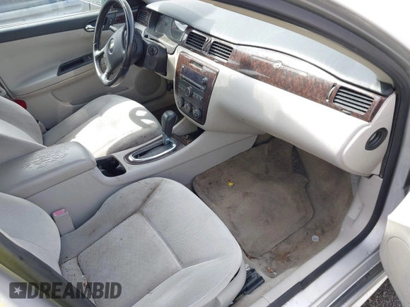 2014 Chevrolet Impala LS with VIN 2G1WA5E30E1180432, listed as a IAAI auction lot 42109853 with 176,974 mi miles and . Bid and sale history available at DreamBid. Image 5.
